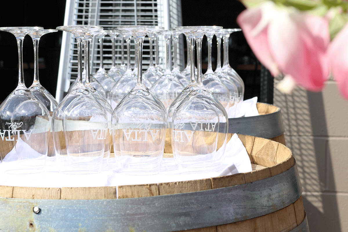 glasses on wine barrel